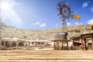 Desk of free space and summer blurred background of garden 
