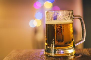glass of beer and bokeh
