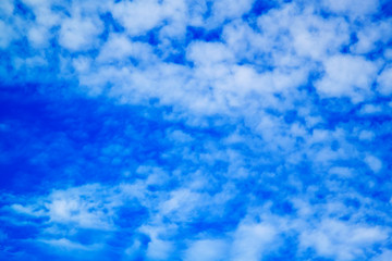 white clouds against blue sky