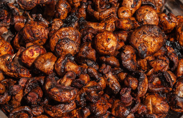 Close up of grilled fried mushrooms  background or texture