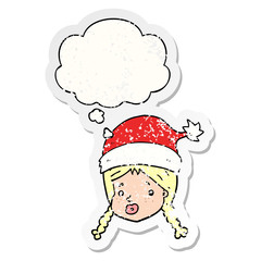 cartoon girl wearing christmas hat and thought bubble as a distressed worn sticker