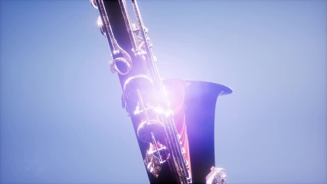 Golden Tenor Saxophone on blue background with light