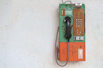 old public telephone on the wall, Vintage public telephone