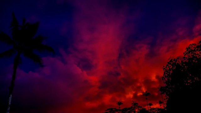 a cinemagraph or animated photo of the lava glow from Pahoa hawaii. the eruption created an everlasting sunset through the night. it could be seen for miles around.