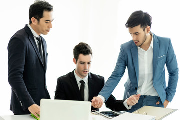 Growing business.Business meeting.Businessmen are meeting to find work destinations.Present business information by notebook.Laptop on the table.Team Business working analysis graph on desk.