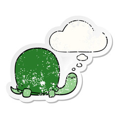 cute cartoon tortoise and thought bubble as a distressed worn sticker