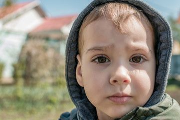 child with a sad face portrait