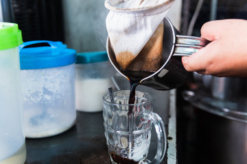 merchants making thai style coffee on his small shop in the countryside  Market