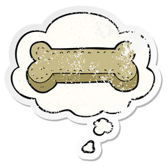 cartoon dog biscuit and thought bubble as a distressed worn sticker