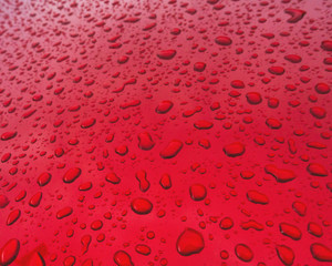 sfondo rosso gocce d'acqua texture