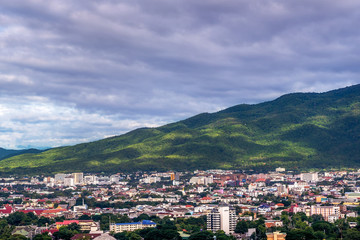 Fototapeta na wymiar CHIANG MAI , THAILAND- JUNE 28, 2019 : Chiang Mai, Thailand at Landscape high angle of Chiang Mai cityscape and Doi Suthep as a background