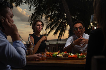 Friends in a seafood restaurant 