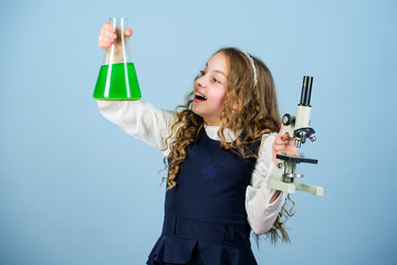 science research in lab. Small girl with microscope. child study bilogy lesson. Discover future. back to school. education & knowledge. small girl scientist with testing flask. Biological sample