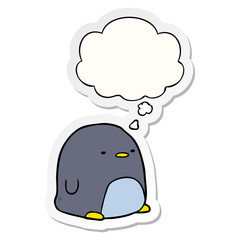 cute cartoon penguin and thought bubble as a printed sticker