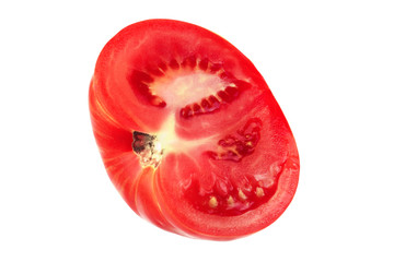 Cut off piece of tomato on white isolated background