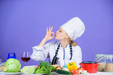 Amazing taste. Turn ingredients into delicious meal. Culinary skills. Woman chef wear hat apron near table ingredients. Girl adorable chef teach culinary. Best culinary recipes to try at home