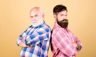 Bearded friends. Barbershop concept. Men bearded hipster stand back to back. Family team. Brutal...