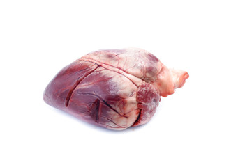 raw pig heart close-up isolated on white background
