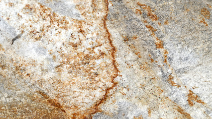 Texture of natural stone. Modern background. Image. Design for poster. Abstract backdrop. Black, grey, biege, sepia. Hole on the surface. Patterns and textures of rocks in nature. Closeup detail stone