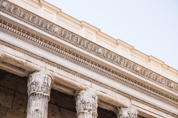 Detail of entablature and columns from The Temple of Hadrian, in Rome, Italy.