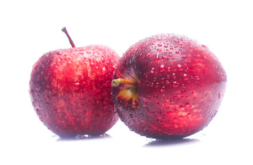 wet Red apple isolated on white background