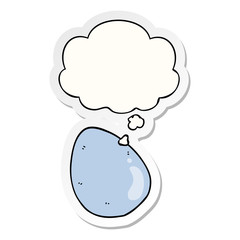 cartoon egg and thought bubble as a printed sticker