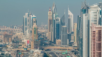 Skyscrapers on Sheikh Zayed Road and DIFC aerial timelapse in Dubai, UAE.