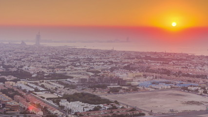 Panorama and aerial view of coastline Dubai at sunset timelapse, United Arab Emirates