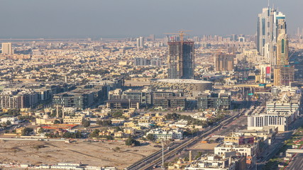Skyscrapers and traffic on Sheikh Zayed Road aerial timelapse in Dubai, UAE.