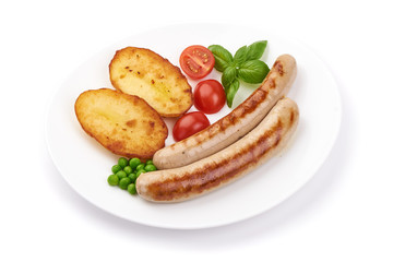 Grilled sausages with baked potatoes, close-up, isolated on white background