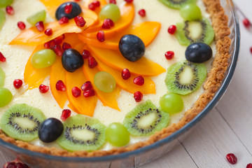 Сake topped with fresh fruits.
