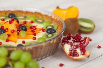 Сake topped with fresh fruits.