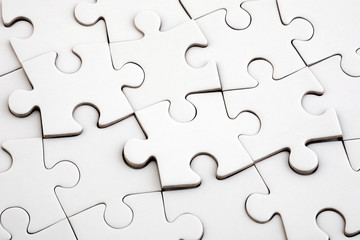 Top view of white jigsaw puzzle