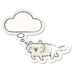 cartoon cat and thought bubble as a distressed worn sticker