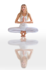 beautiful flexible woman doing yoga poses on white