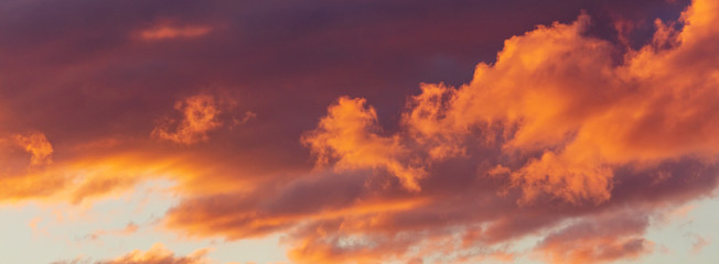 Beautiful clouds at sunset as background