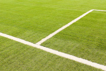 Obraz premium New artificial football field. Close-up. Background. Texture.