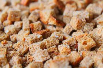 Small crackers. Dried bread. Close-up. Background. Texture.