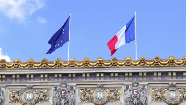 French flag and European flag on the top of the Opera Garnier in Paris France