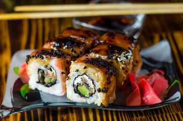 sushi rolls with red fish