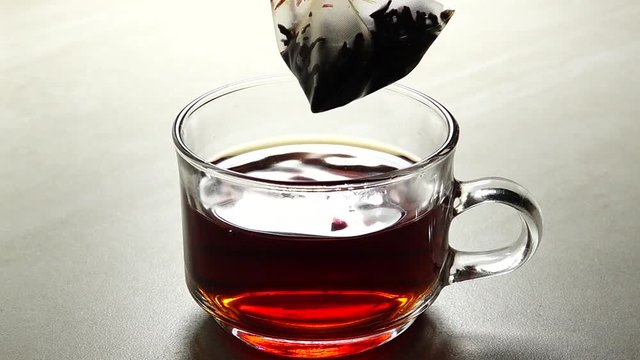 HD 1080p super slow Hot tea cup on a frosty winter day window background
