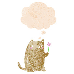 cute cartoon cat with flower and thought bubble in retro textured style