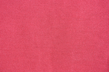 Fototapeta na wymiar Texture of red crumpled cotton close up