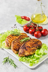 Balsamic rosemary grilled chicken breasts. Healthy dinner. Selective focus, space for text.
