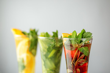 Three kinds of cooling fruit drinks. Concept for drinks, summer, heat, alcohol, party and bar