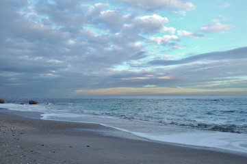 cirrus clouds over the sea at sunset. romantic seascape sunset in pastel colors. pastel sunset sky with cloudscape over the Black sea