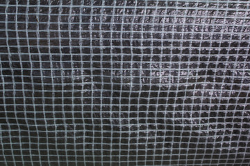 abstract square grid of industrial plastic cellophane net texture background