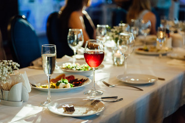 Festive wedding table setting. Empty wine glasses