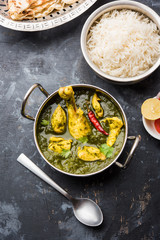 palak/spinach Chicken or Murg Saagwala served in a bowl with Naan and rice
