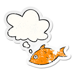 cartoon fish and thought bubble as a distressed worn sticker